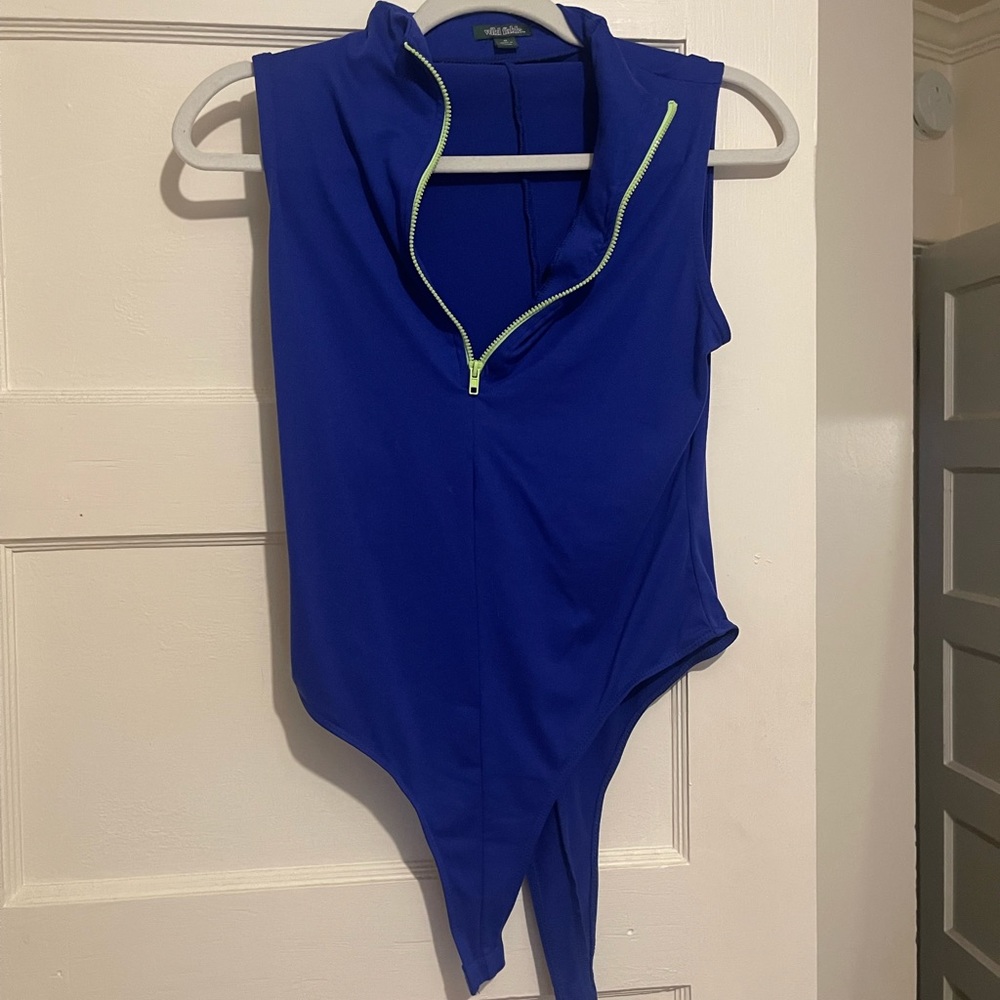 Blue body suit with neon green half zipper